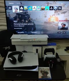 PlayStation 5 + 2 controllers + headset + charger + cod + Fifa23 + bag
