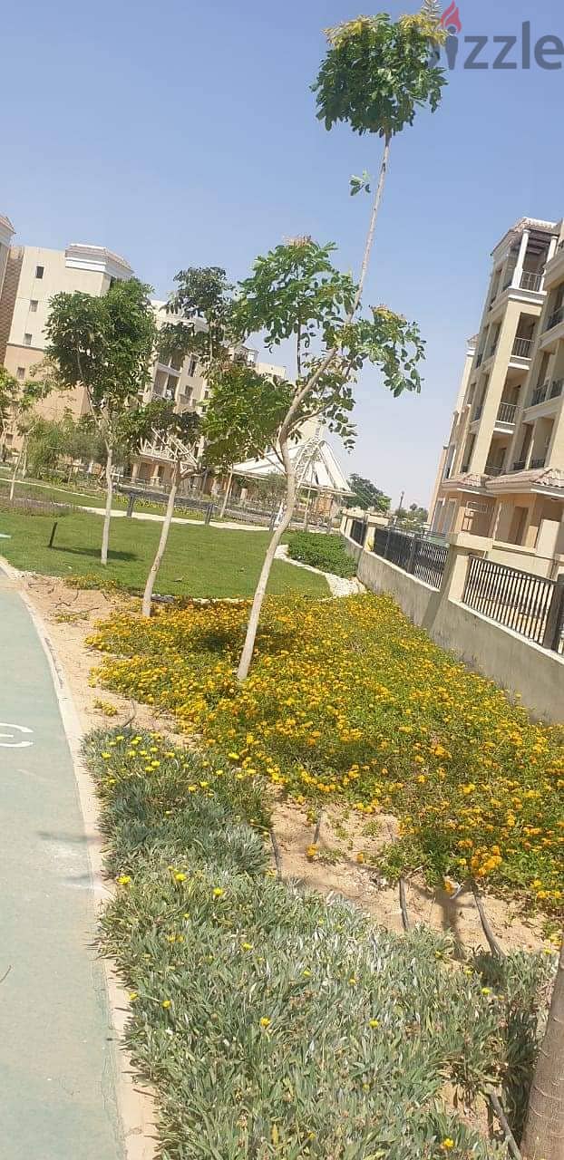 Duplex with a large area of 206 square meters and a distinctive garden of 117 square meters for sale in Sarai Compound, Elan phase, New Cairo, with a 10