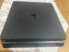 Playstation 4 With A Controller.