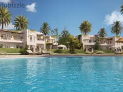 One-room chalet with a full view of the Crystal Lagoon, fully finished, in Seashore. . Hyde park. . Ras El-Hekma