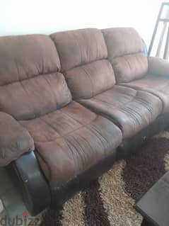 3 brown sofas
