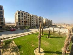 For sale, an apartment with a garden 165 sqm special location, ready to move, in Sarai compound Mostakbal City