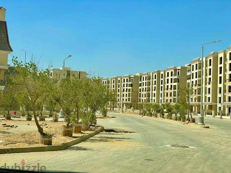For sale, an apartment with a garden 165 sqm special location, ready to move, in Sarai compound Mostakbal City 1