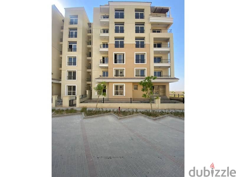For sale, an apartment with a garden 165 sqm special location, ready to move, in Sarai compound Mostakbal City 7