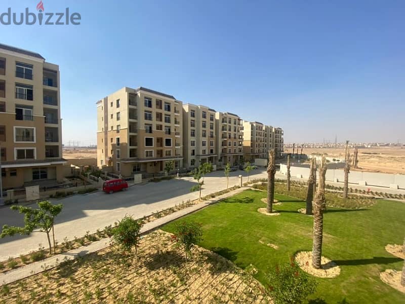 For sale, an apartment with a garden 165 sqm special location, ready to move, in Sarai compound Mostakbal City 10