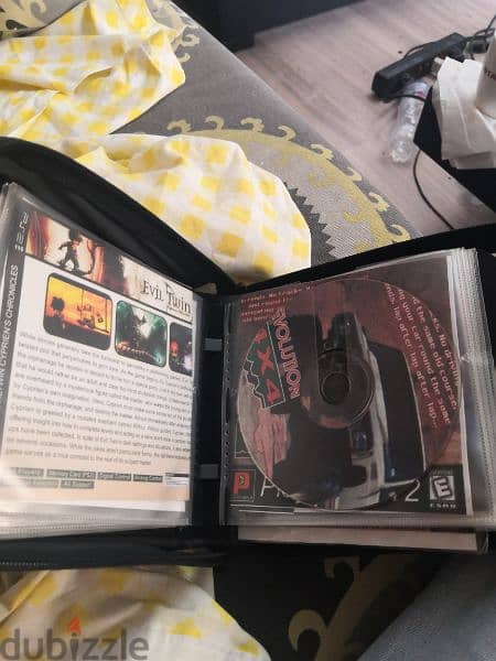 24 Playstation 2 games with carrying case 2