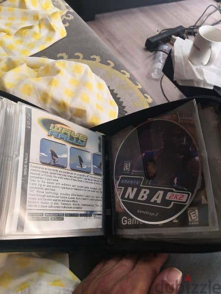 24 Playstation 2 games with carrying case 4