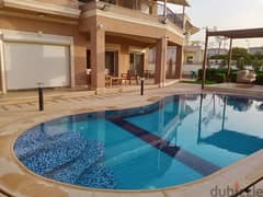 Standalone Villa 700. M in Paradise Compound New Cairo fully furnished with elevator and swimming pool for sale at a special price