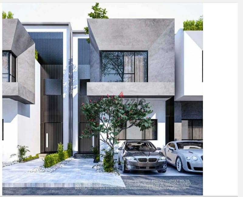 Townhouse villa 261 meters with a 10% down payment in the Fifth Settlement in front of the American University in a villas-only compound 1