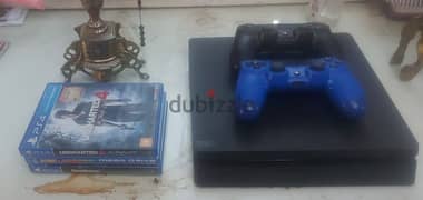 PlayStation 4 slim + 2 controls + 4 games