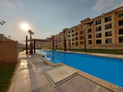 A 3-bedroom apartment for sale in Sarai compound on the Suez Road, with installment over 8 years 0
