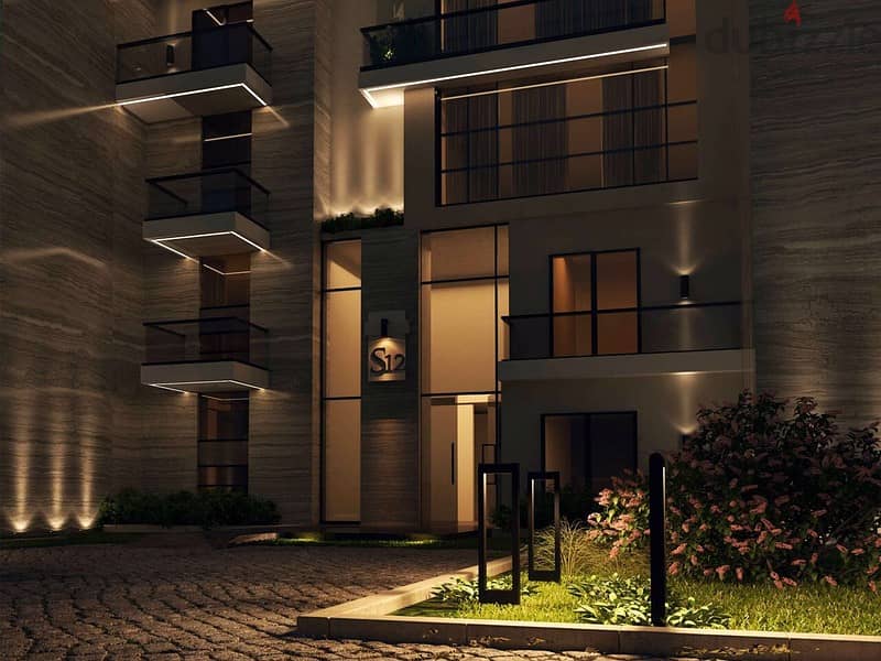 Apartment with garden, immediate receipt, 10% down payment, distinctive view, “Sun Capital” Compound 0