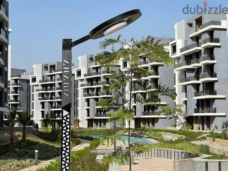 Apartment with garden, immediate receipt, 10% down payment, distinctive view, “Sun Capital” Compound 5