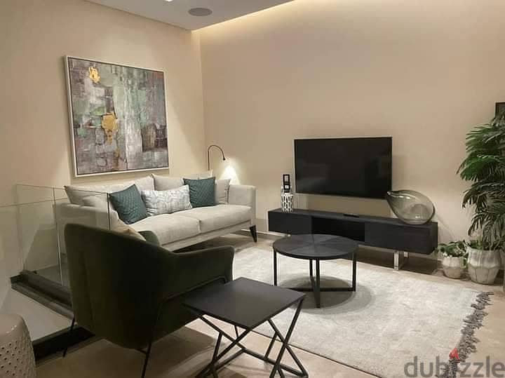Luxury apartment for sale in installments on a very special view on the landscape in front of Cairo Airport in the Taj City compound 8