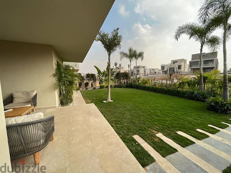 In installments, I own a fully finished apartment in the most prestigious compound in October - Badya Palm Hills 5