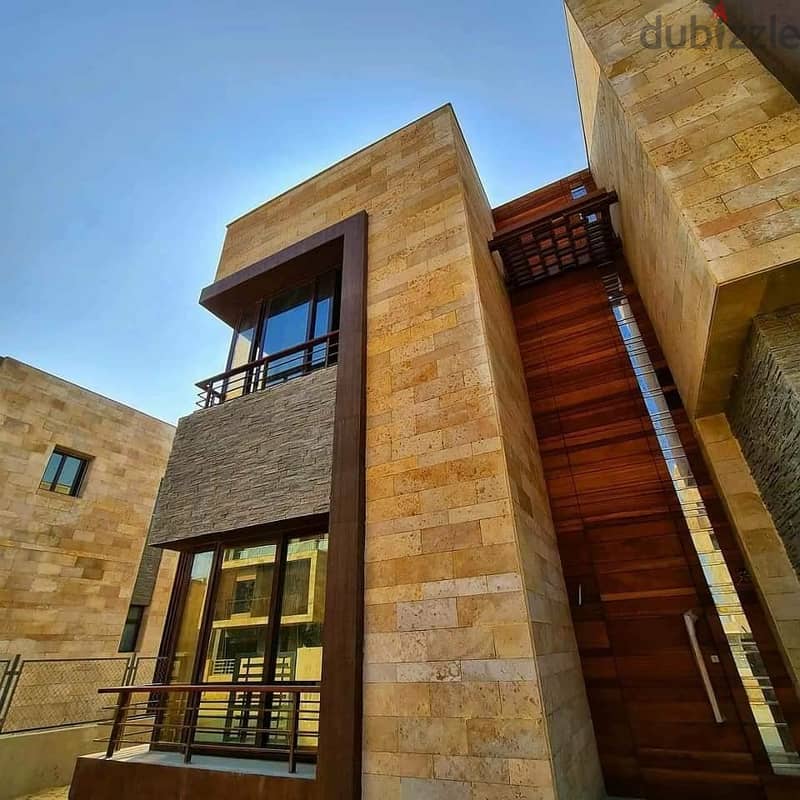 Three-storey villa for sale with a 38% cash discount and installments over 8 years in Taj City, New Cairo 9