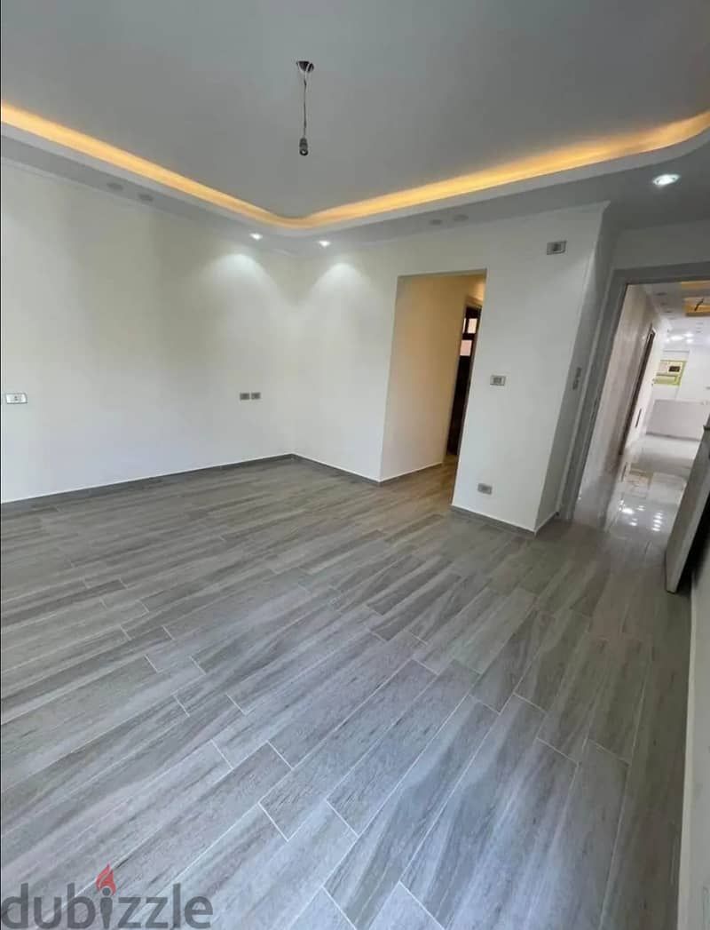 Finished apartment for sale, immediate receipt, in Al Maqsad Compound, the Administrative Capital, with a distinctive view on the iconic tower, with f 4