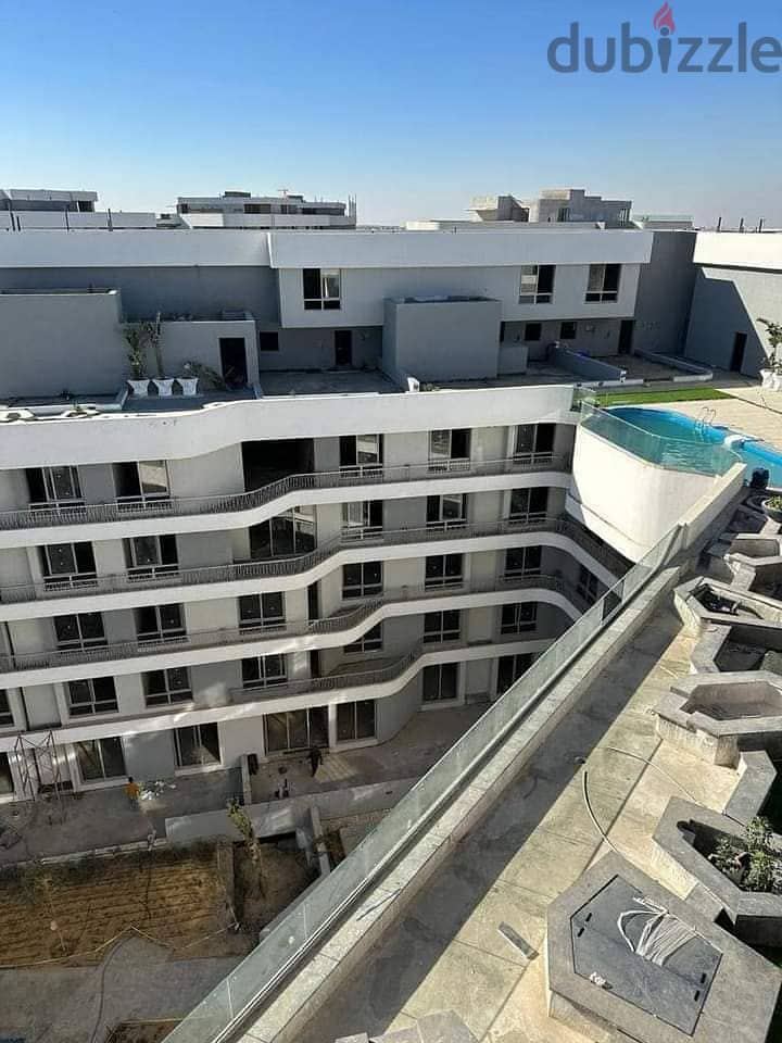 شقة للبيع  112 متر في كمبوند بلوم فيلدز المستقبل سيتي 2