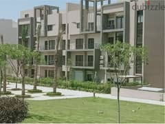 Apartment for sale with private garden, in installments, fully finished, with air conditioners, at a price including maintenance and garage, with a vi