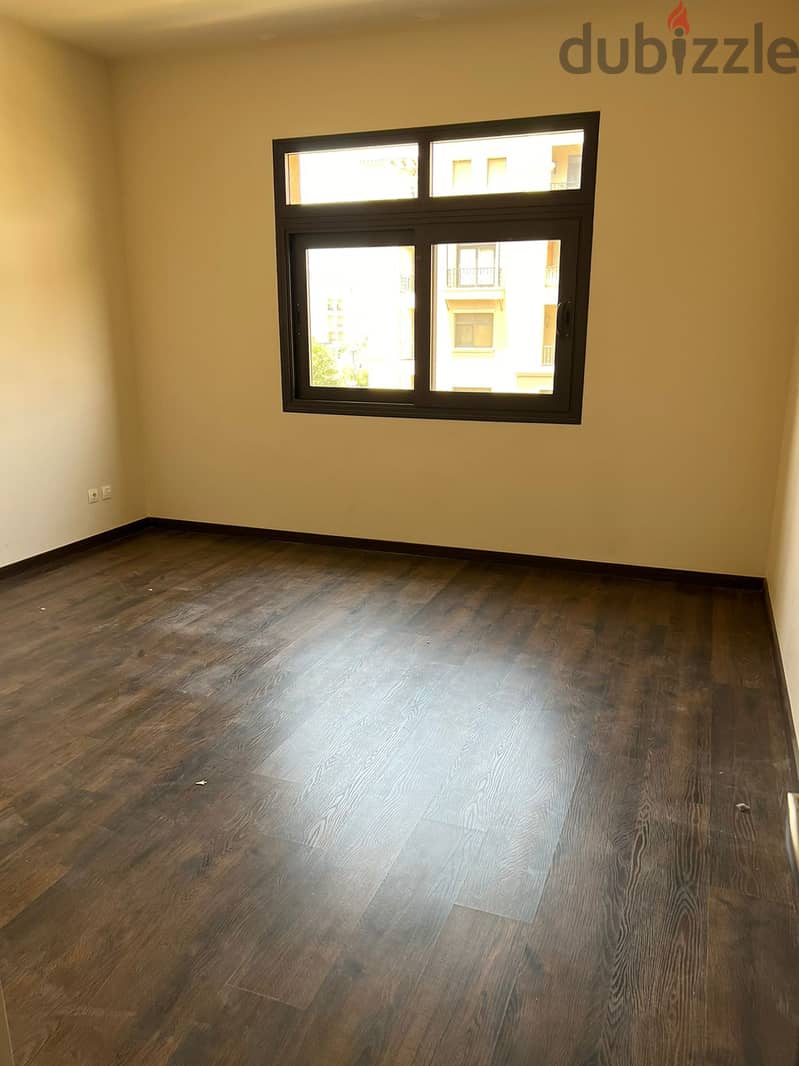 garden view apartment for rent (with kitchen & ac's) in mivida new cairo 7