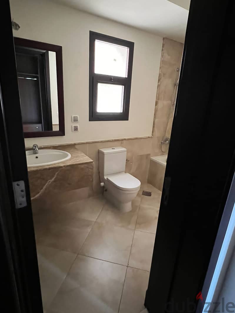 garden view apartment for rent (with kitchen & ac's) in mivida new cairo 8