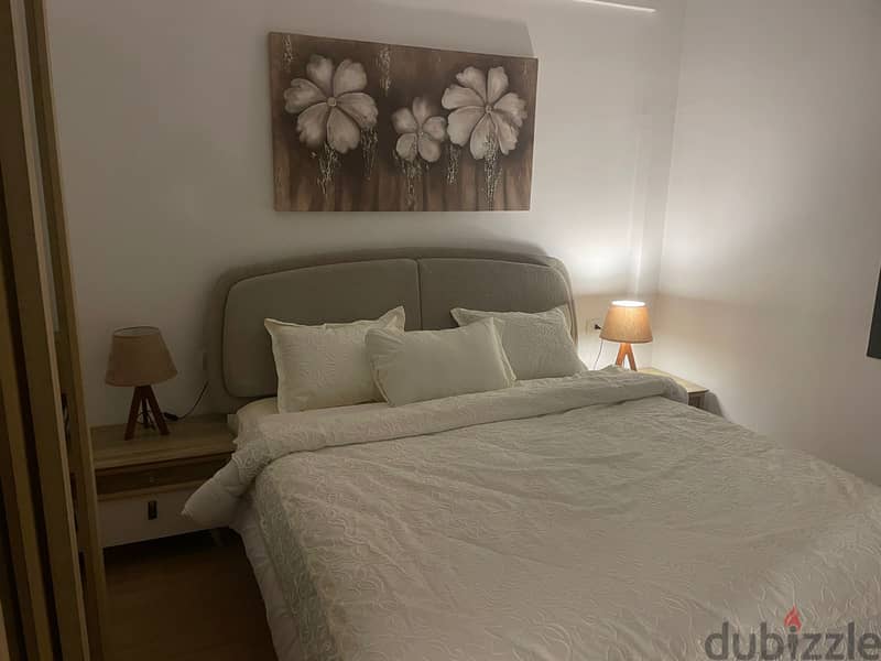 Furnished apartment for sale with air conditioners, prime location, landscaped view 3