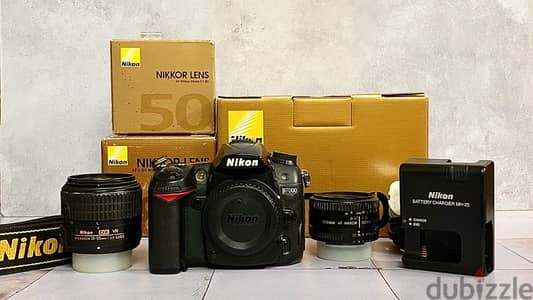 كاميرا نيكون - d7000 nikon camera وعدستين والعلب