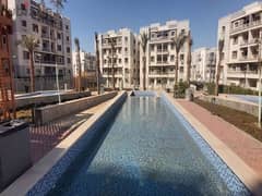Apartment with garden for sale in installments in Jade Compound in front of Al-Rehab, immediate receipt, Fifth Settlement