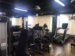 Gym for rent in Sheikh Zayed_Downtown area_450m, first floor, fully finished and equipped upper floor