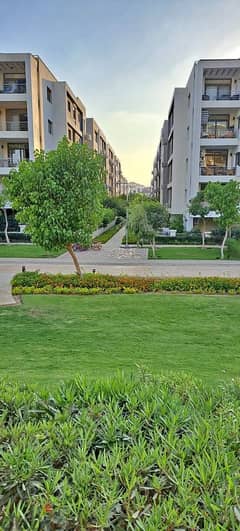 Duplex with garden view, unbroken, for sale in a compound with full services and facilities in Taj City At the offering price