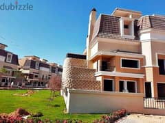 Independent villa for the price of an apartment (3 floors) with a private garden, prime location on Suez Road in Sarai Compound, New Cairo.