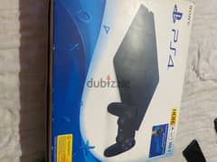 ps4 slim 500gb with 3 controllers and 5 games