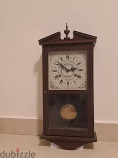 Antique wall clock ساعة حائط قديمة