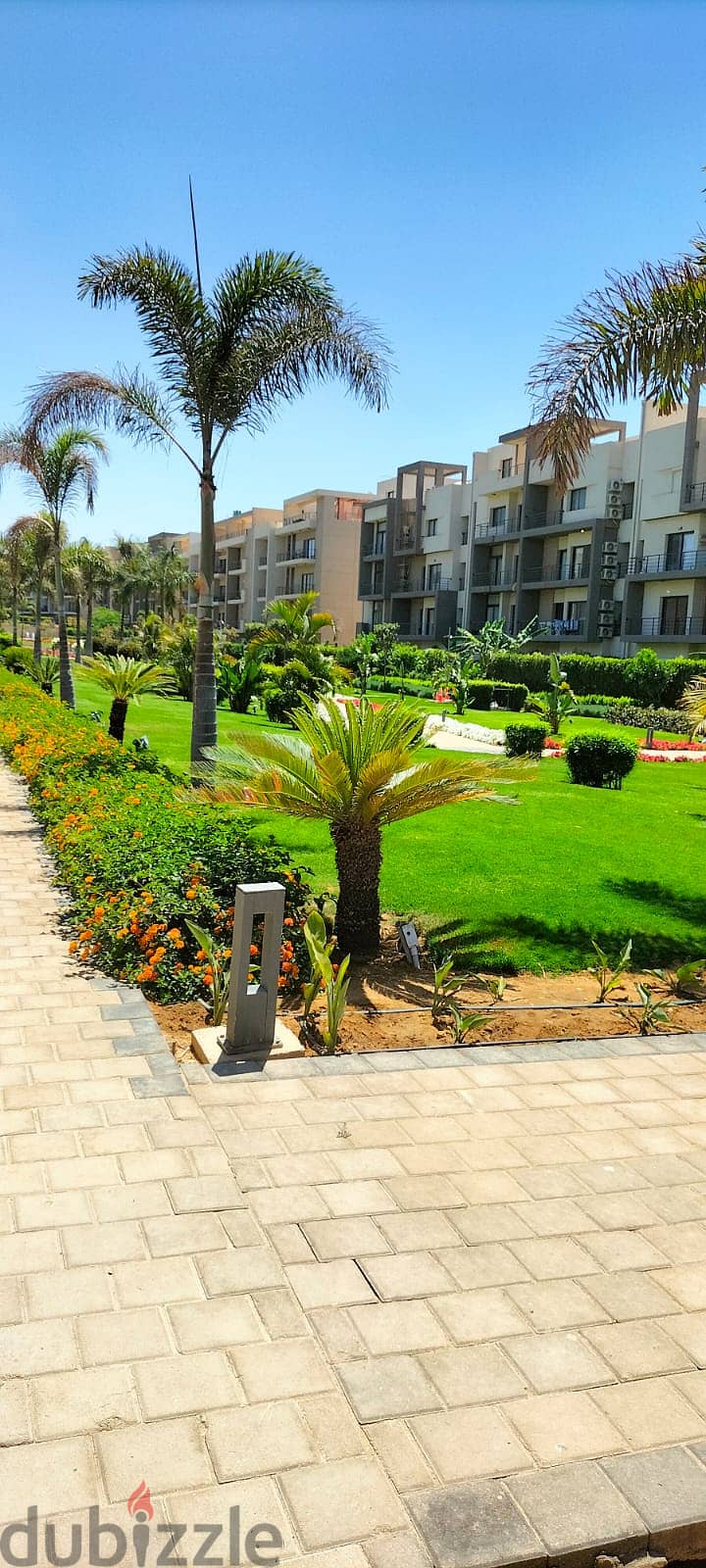 Apartment for sale with private garden, fully finished, with air conditioners and ready to move with an open view and landscape 3