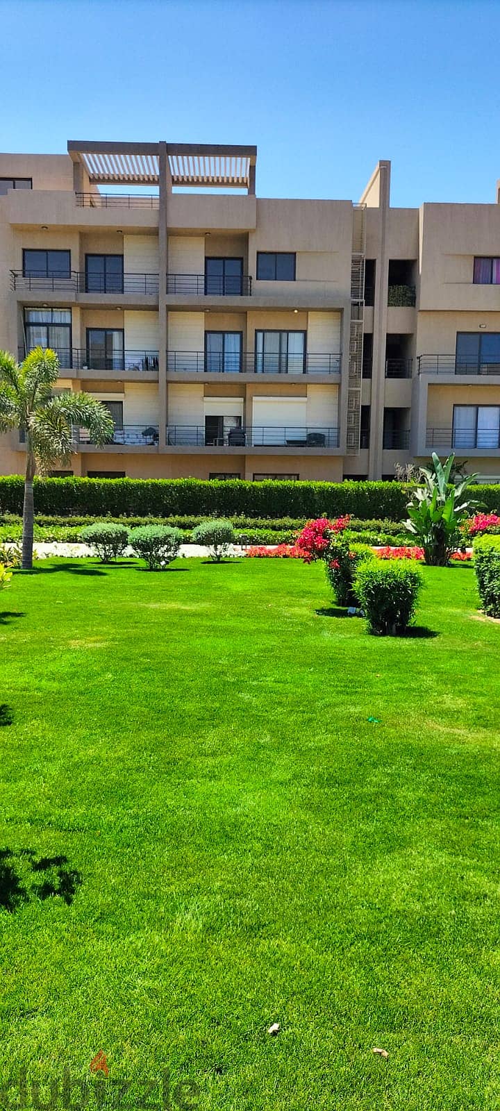 Apartment for sale with private garden, fully finished, with air conditioners and ready to move with an open view and landscape 4
