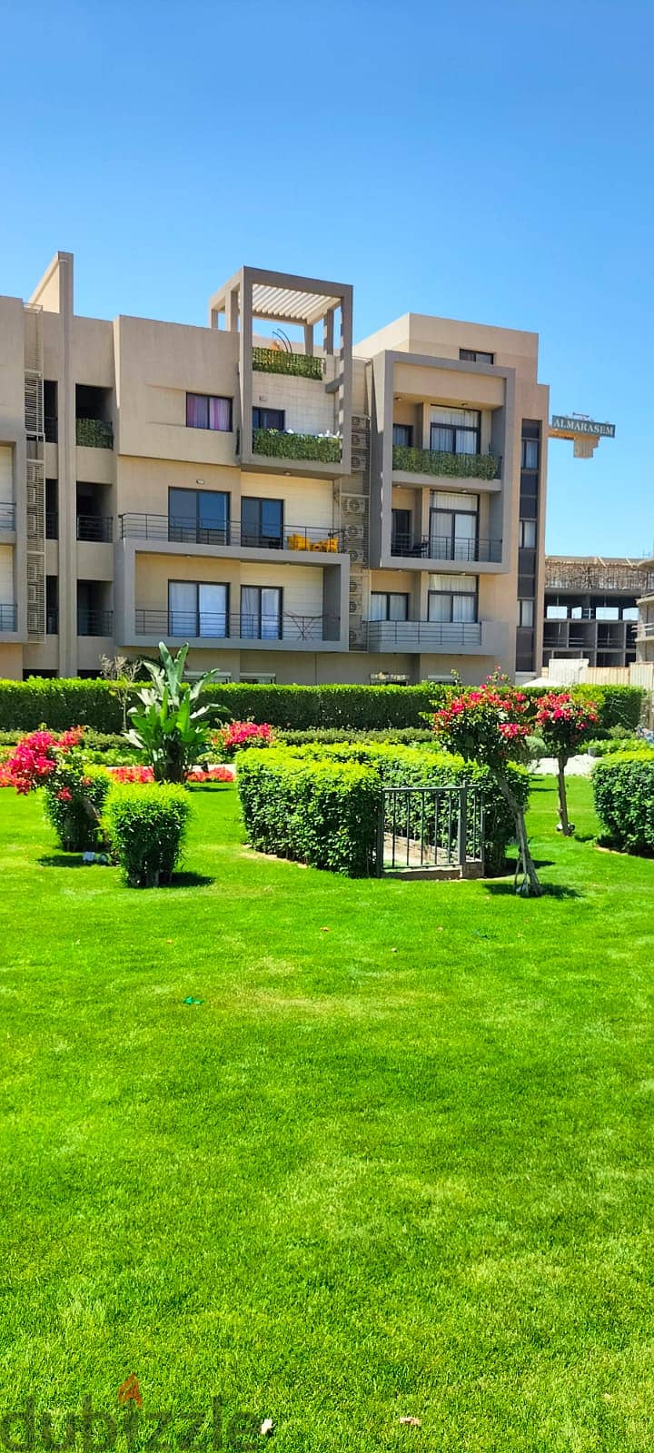 Apartment for sale with private garden, fully finished, with air conditioners and ready to move with an open view and landscape 5