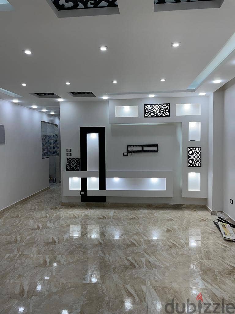 Duplex for sale, ultra super luxury, Al Ferdous villas, in front of Dreamland 2
