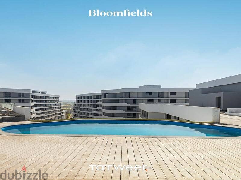 شقة بموقع متميز للبيع بمقدم وتقسيط في بلوم فيلدز المستقبل سيتي Bloomfields 9