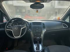 Gray Opel Astra 2014