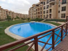 apartment for sale 128m+77m garden ,ready to move new cairo