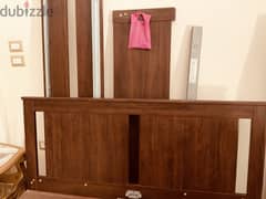 ALMOST NEW - IKEA Double Bed and Sprung Mattress/2 bedside cabinets