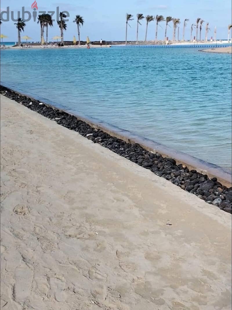Chalet 2 Bed Lagoon View for Sale at Hyde Park Sea Shore North Coast Ras Alheikma with installments 8 years 10% downPayment Prime Location first row 3