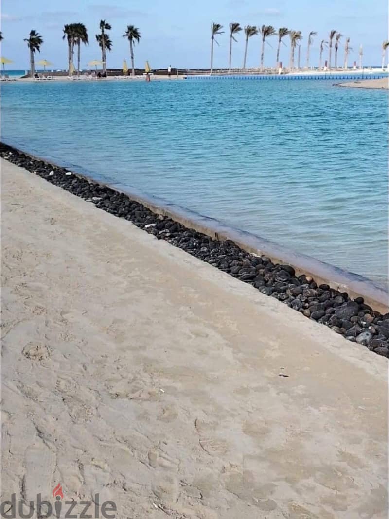 Chalet 2 Bed Lagoon View for Sale at Hyde Park Sea Shore North Coast Ras Alheikma with installments 8 years 10% downPayment Prime Location first row 7