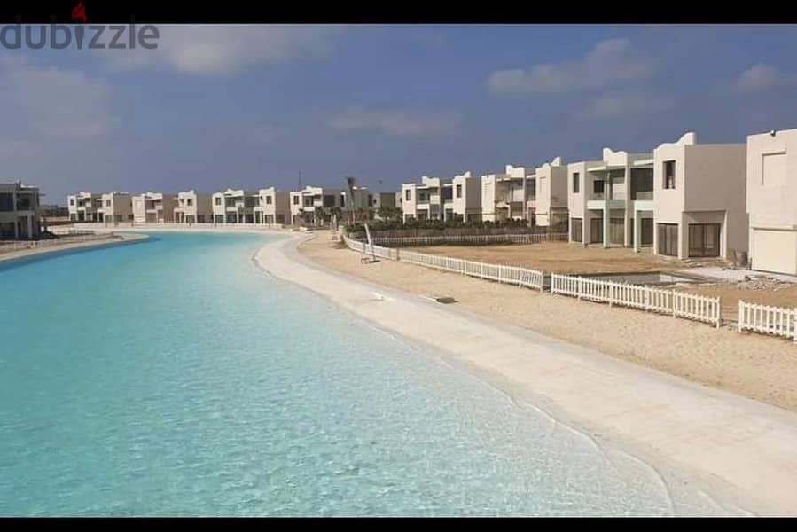 Chalet 2 Bed Lagoon View for Sale at Hyde Park Sea Shore North Coast Ras Alheikma with installments 8 years 10% downPayment Prime Location first row 12
