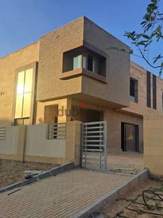 Villa for sale in Taj City Compound, area of 175 square meters, 3 floors, stand alone, prime location, in front of Cairo Airport, in a special stage 0