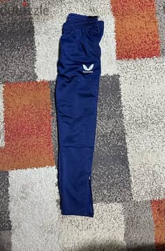 castore track pants navy blue