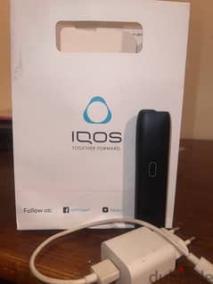 IQOS with its box and original charger