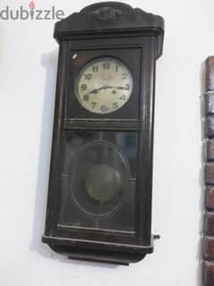 ساعة قديمة بندول و دقات للبيع