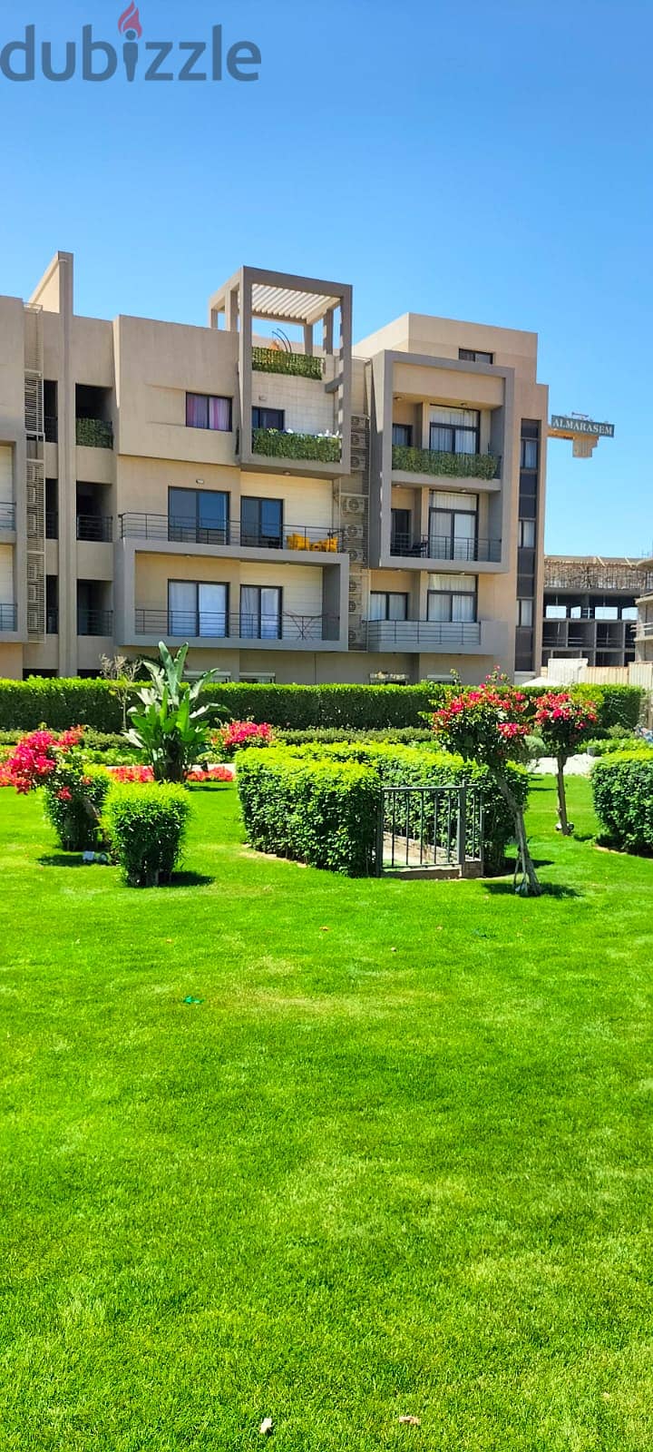 Apartment for sale with private garden with The kitchen and appliances are less than the market price, including maintenance,  ready to movewith 5