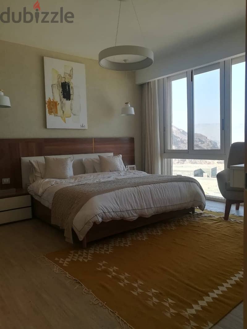 With a 5% down payment, an apartment for sale in a private garden, fully finished, with air conditioners, and fully furnished (Mont Gualal), Ain Sakha 2